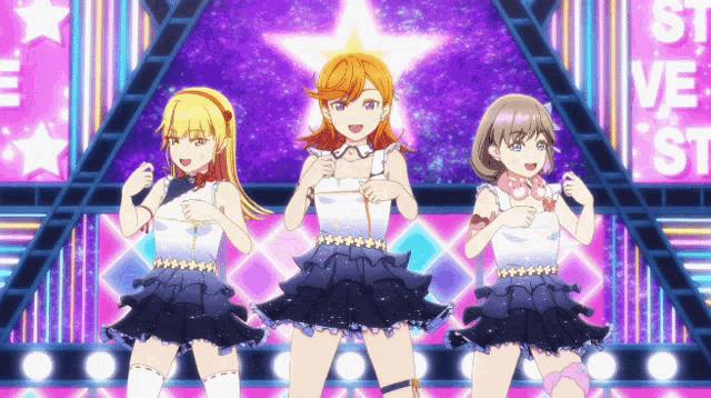three anime girls are dancing in front of a sign that says live