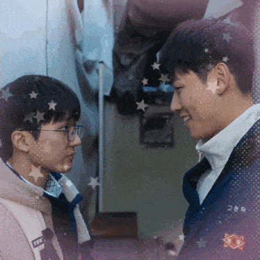 two young men looking at each other with one wearing a jacket that says ' ffk ' on it