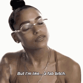 a woman wearing glasses is saying `` but i 'm like ... a fab bitch '' .