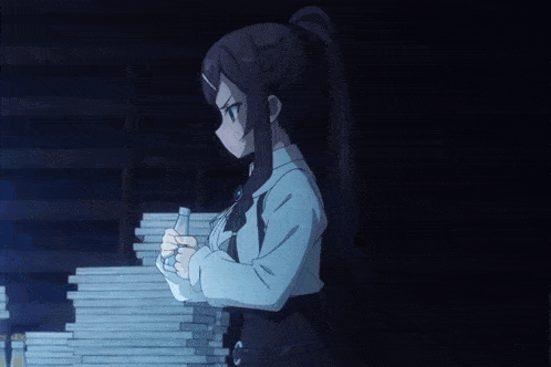 a girl drinking from a bottle in front of a pile of books
