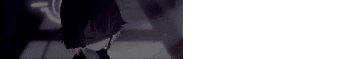 a close up of a person 's face in the dark .
