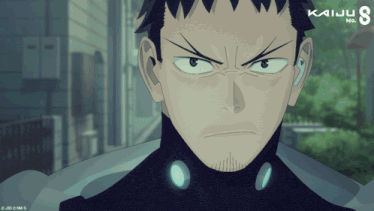 a picture of a man with kaiju nc written on the bottom right