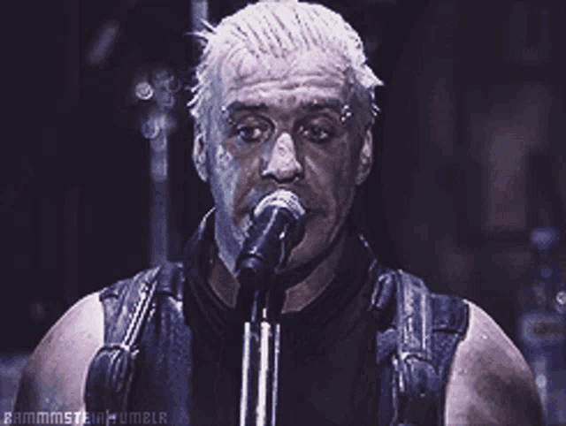 a man singing into a microphone with the name ramimstein tumblr written on the bottom