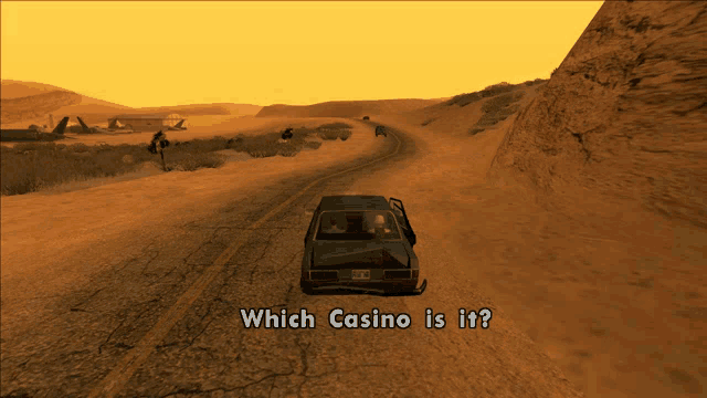 a car is driving down a desert road with which casino is it written on the screen
