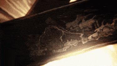 a close up of a piece of metal with a drawing on it that says ' ncr ' on it