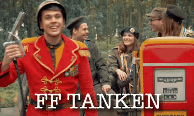 a group of people are standing in front of a red gas pump that says ff tanken