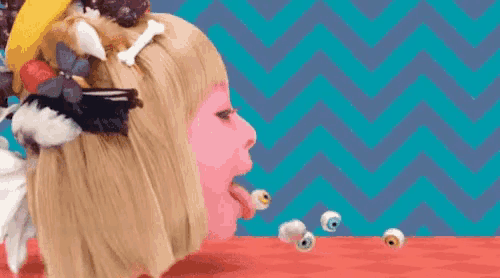 a woman with a pink face and a bunch of objects in her hair