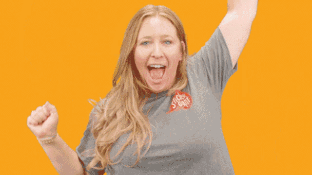 a woman is celebrating national sticker day by raising her arms in the air