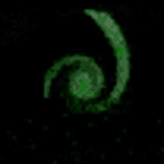 a green background with a black border and a few spots of light on it .
