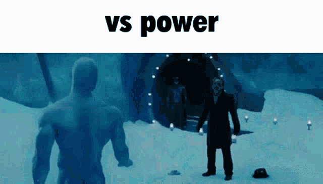 a man in a suit is standing in the snow in front of a tunnel that says vs power