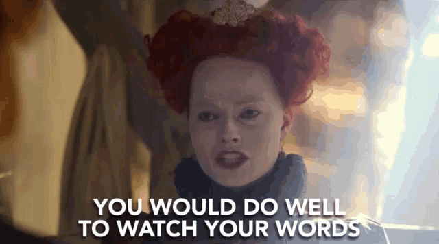 a woman with red hair and the words " you would do well to watch your words " on the bottom
