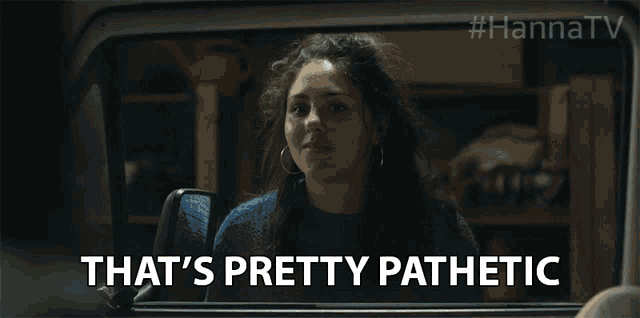 a woman says that 's pretty pathetic while looking out of a car window