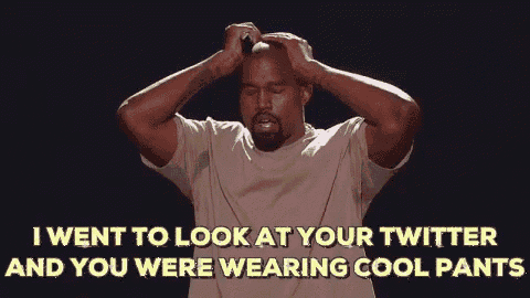 a man is holding his head and says i went to look at your twitter and you were wearing cool pants .