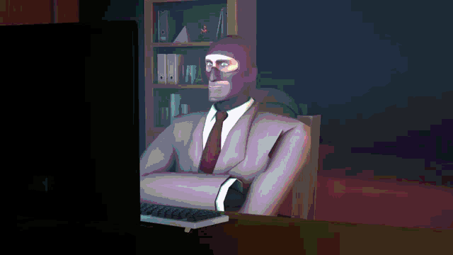 a man with a mask on his face is sitting in front of a computer