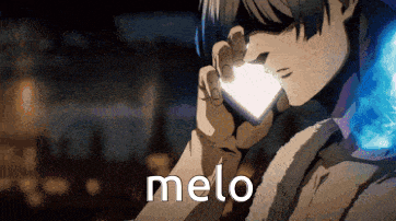 a man is talking on a cell phone and the word melo is on the bottom of the image