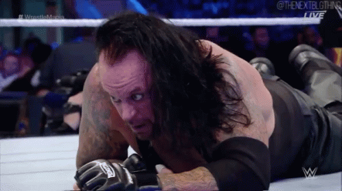The Undertaker Crawling GIF - The Undertaker Crawling Wwe GIFs