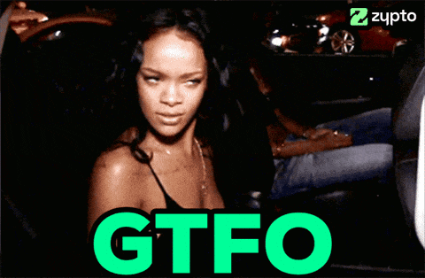 a woman is sitting in a car with the word gtfo on the bottom