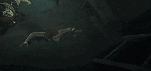 a man with a red hat is crawling on the floor