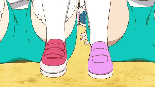 a cartoon drawing of a person 's feet wearing pink and red shoes