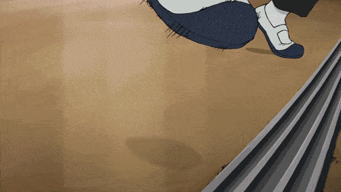 a person wearing a pair of blue shoes is walking on a railroad track