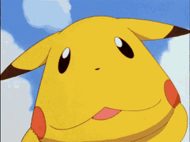 a close up of a pikachu with a blue sky behind it