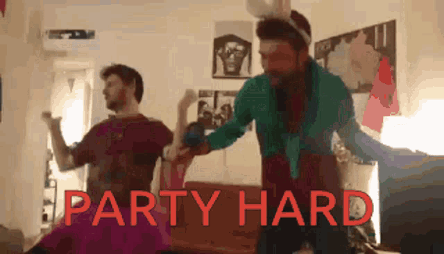 two men are dancing in a room with the words party hard written on the bottom