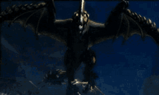 a close up of a painting of a dragon with a blue background