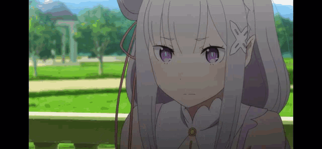 emilia from re zero starting life in another world is sitting on a balcony looking at the camera .