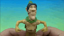 a person is holding a toy in their hand with a green hat on