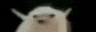 a blurry picture of a sheep with a black background .