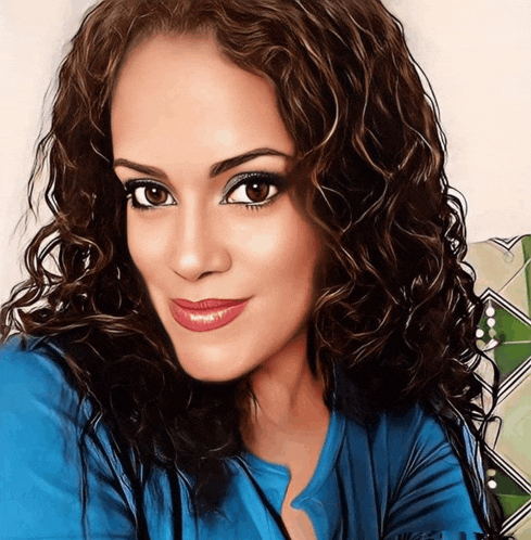 a woman with curly hair wearing a blue shirt is smiling