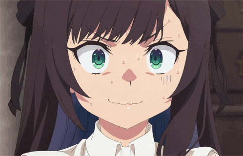 a girl with dark hair and green eyes looks angry