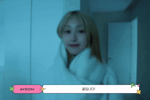 a woman is wrapped in a white blanket and says ayeon in a pink box