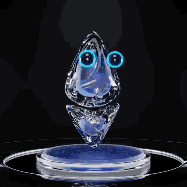a statue of a frog with blue eyes is sitting on a white circle