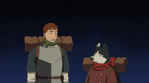 a man and a dog are standing next to each other in a dark room