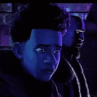 a close up of a person 's face in a dark room .