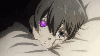 a person with purple eyes is laying on a bed .
