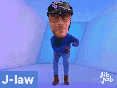 a man with glasses and a hat is dancing in a room with the word j-law on the bottom right