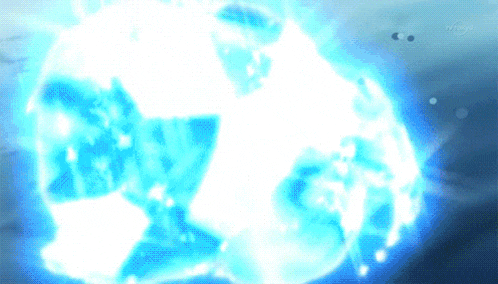 a blue glowing object is being displayed on a television screen