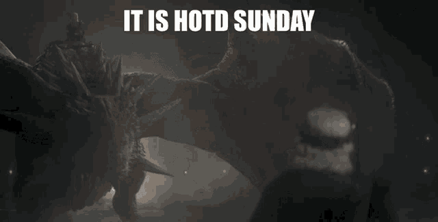 a picture of a dragon with the words it is hotd sunday below it
