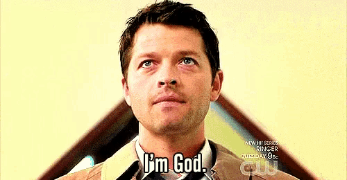 a man in a suit and tie is saying `` i 'm god '' while looking up .