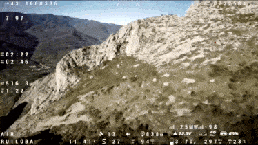 an aerial view of a mountain with the time 7:07