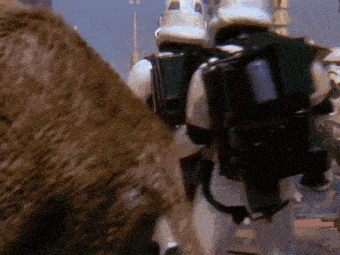 a group of storm trooper soldiers are standing next to each other .