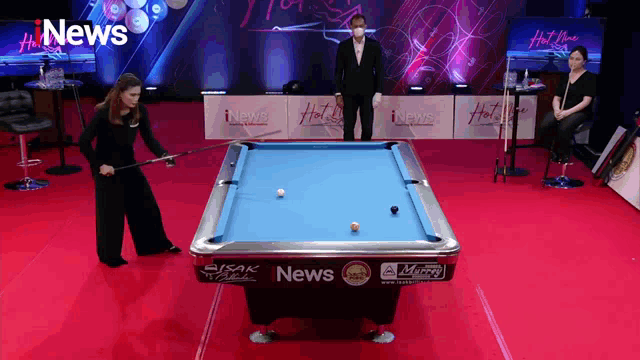 a pool table with the word news on the side