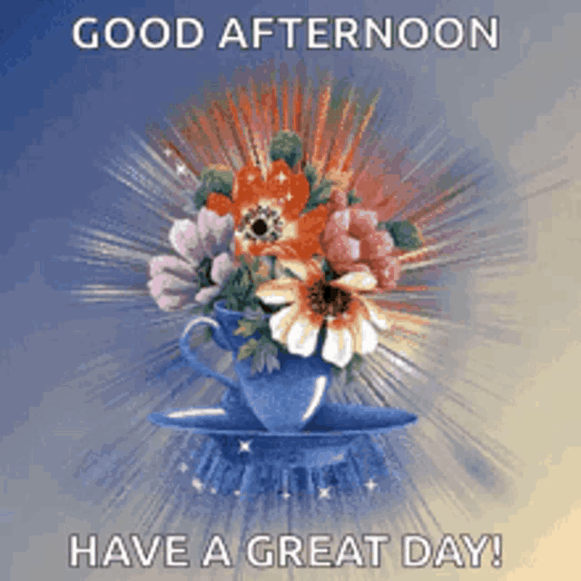 a picture of flowers in a teacup with the words good afternoon have a great day