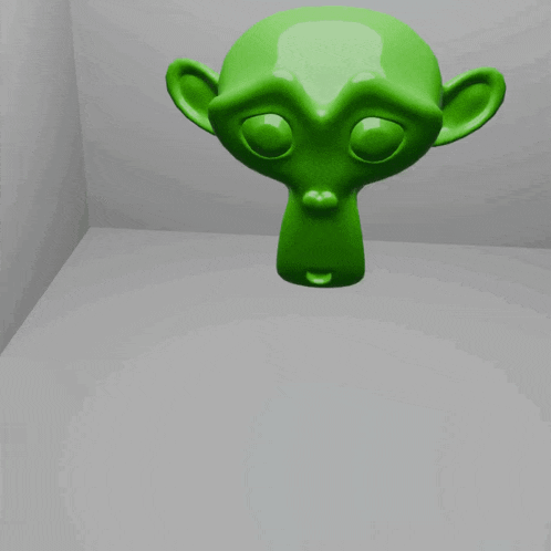 a green monkey head hanging from the ceiling in a room