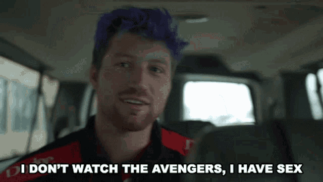 a man with purple hair says " i don t watch the avengers , i have sex "