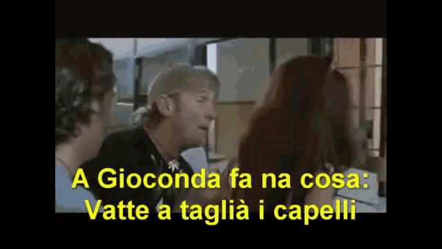 a man talking to a woman with the words a gioconda fa na cosa vatte a taglia i capelli below him