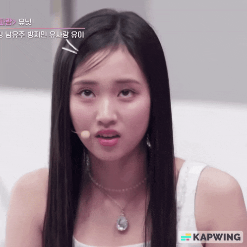 a close up of a woman 's face with the word kapwing on the bottom left