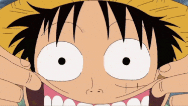 a close up of a cartoon character 's face with big teeth